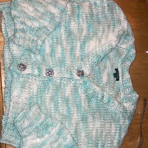 A knitted crop top Joel buttoned up blue and teal